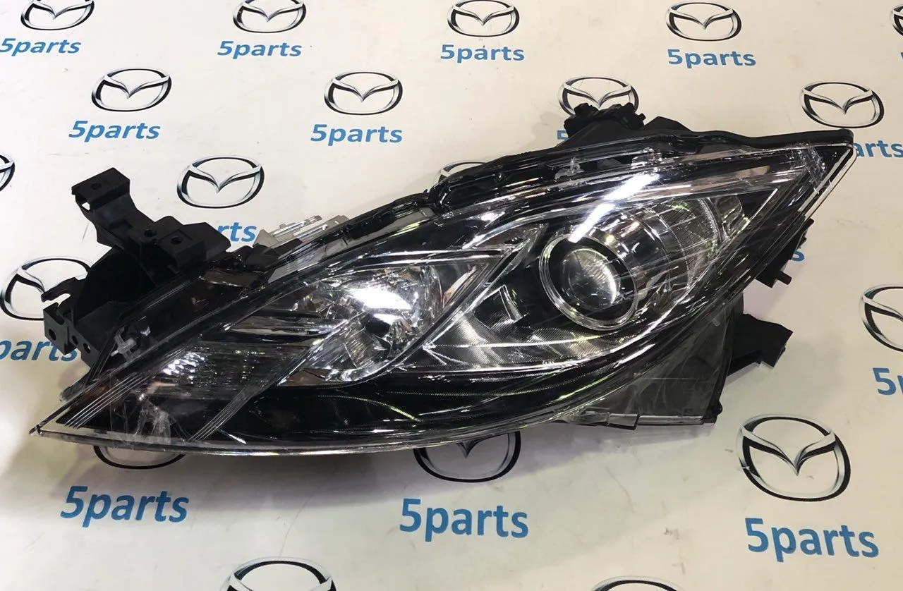 Фара основная левая M6 (GH) 2010-2012