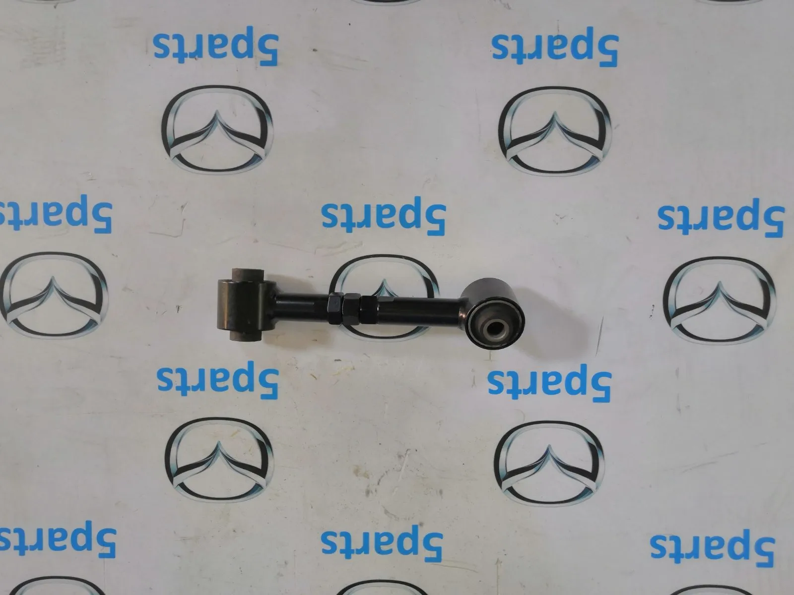 Рычаг задний сход-развальный M6 (GG) 2002-2007