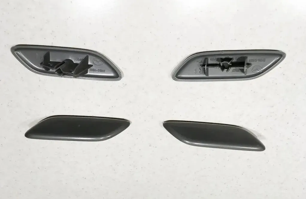 Крышка омывателя фар правого M3 (BL) 2011-2013