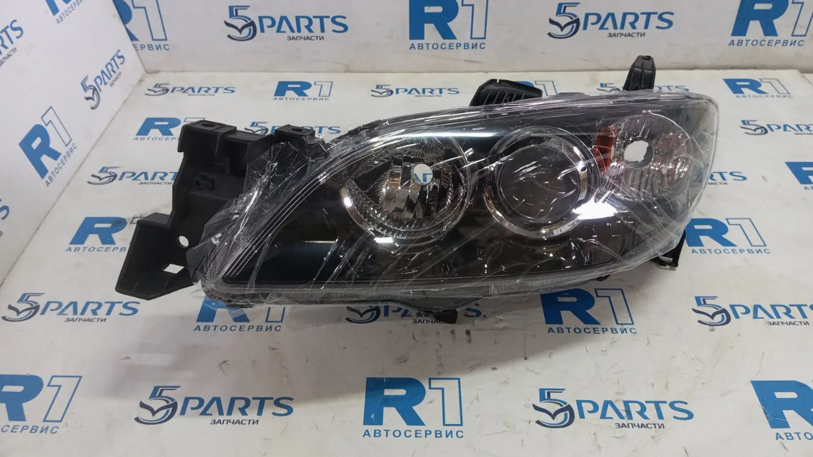 Фара основная левая M3 (BK) SDN 2003-2009