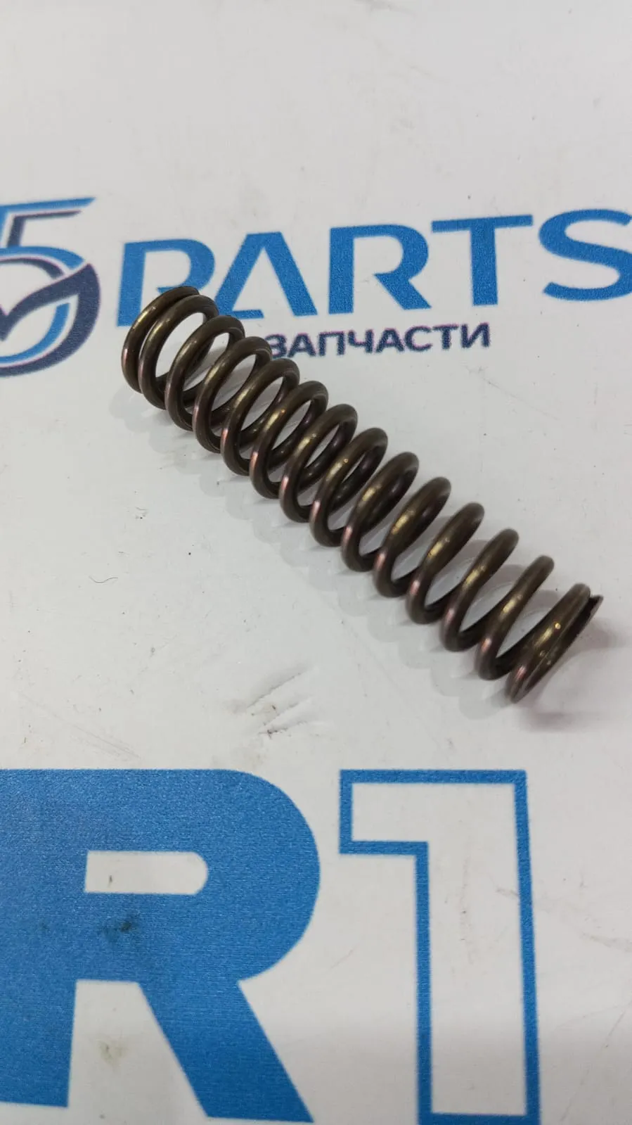 Пружина крышки шестерни 1,6