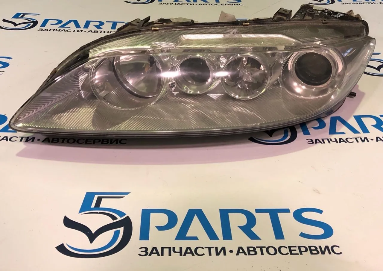 Фара основная левая M6 (GG) 2002-2005