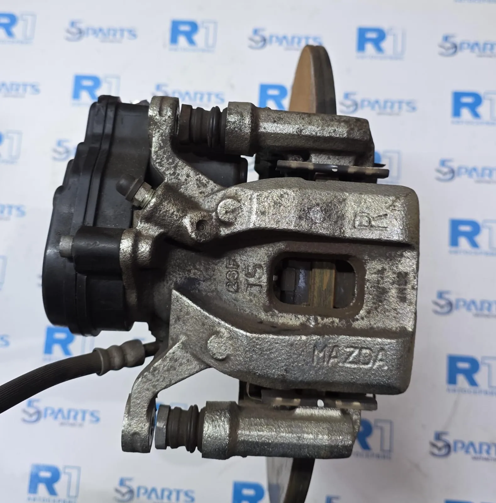 Суппорт тормозной задний правый электрический CX-9 (TС) 2017-2021