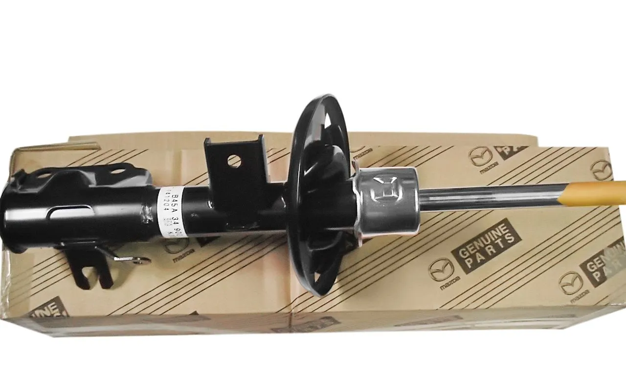 Амортизатор передний левый (стойка) M3 (BM, BN, BP) 2013-2023