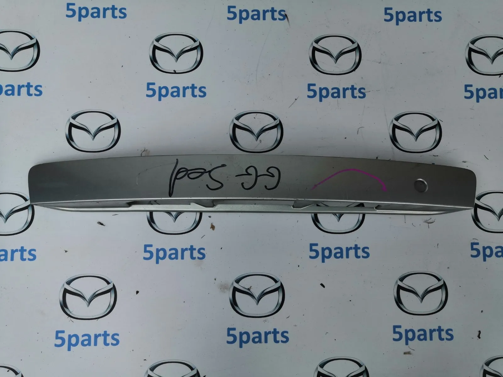 Накладка подсветки номерного знака M6 (GG) SDN 2002-2007