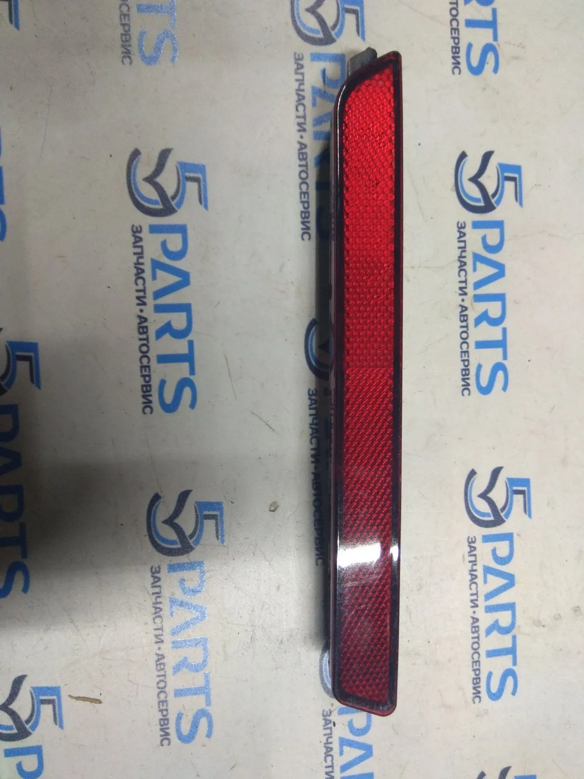 Катафот бампера заднего левый M3, M6, CX-7