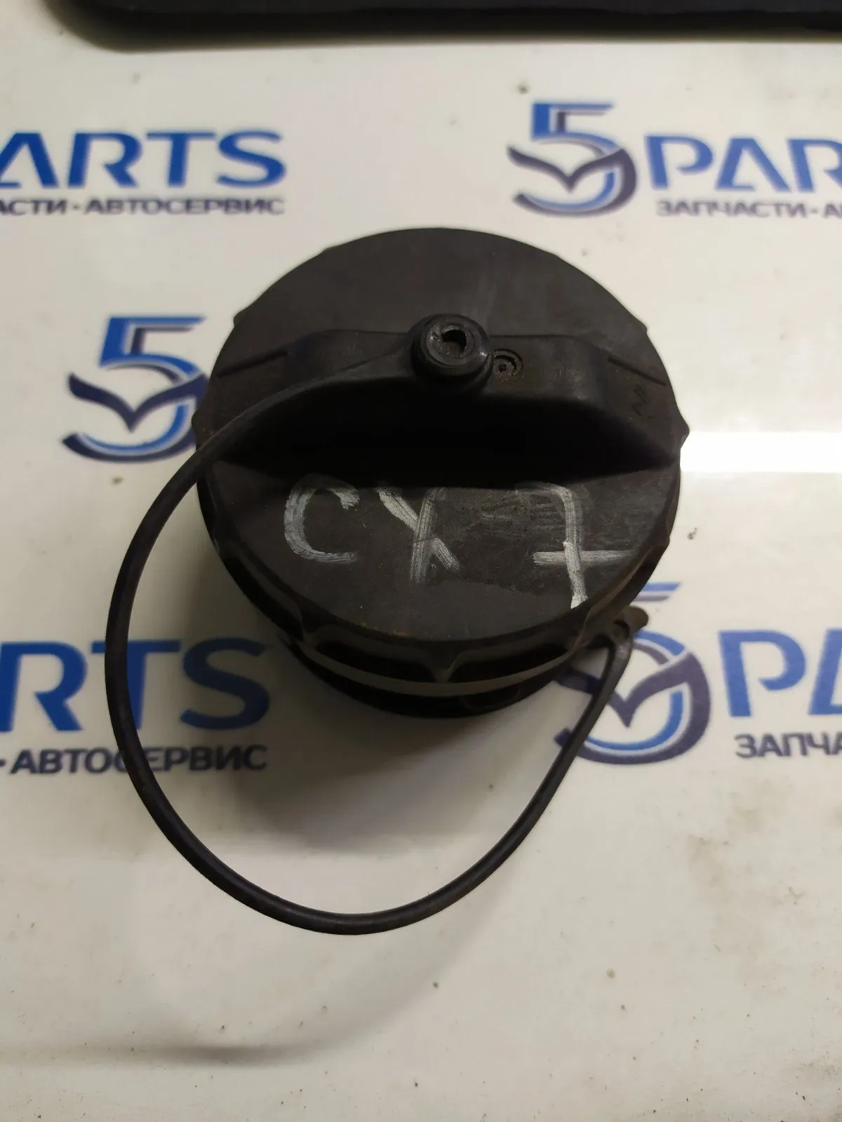 Крышка бензобака M6, CX-7