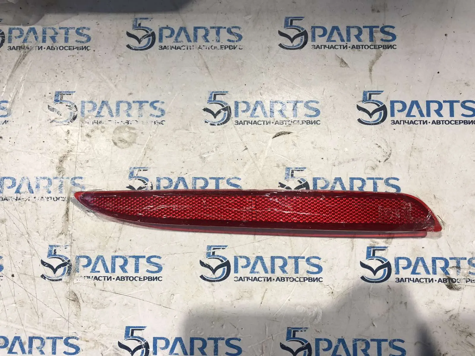 Катафот бампера заднего левый M3 (BL) SDN 2009-2011