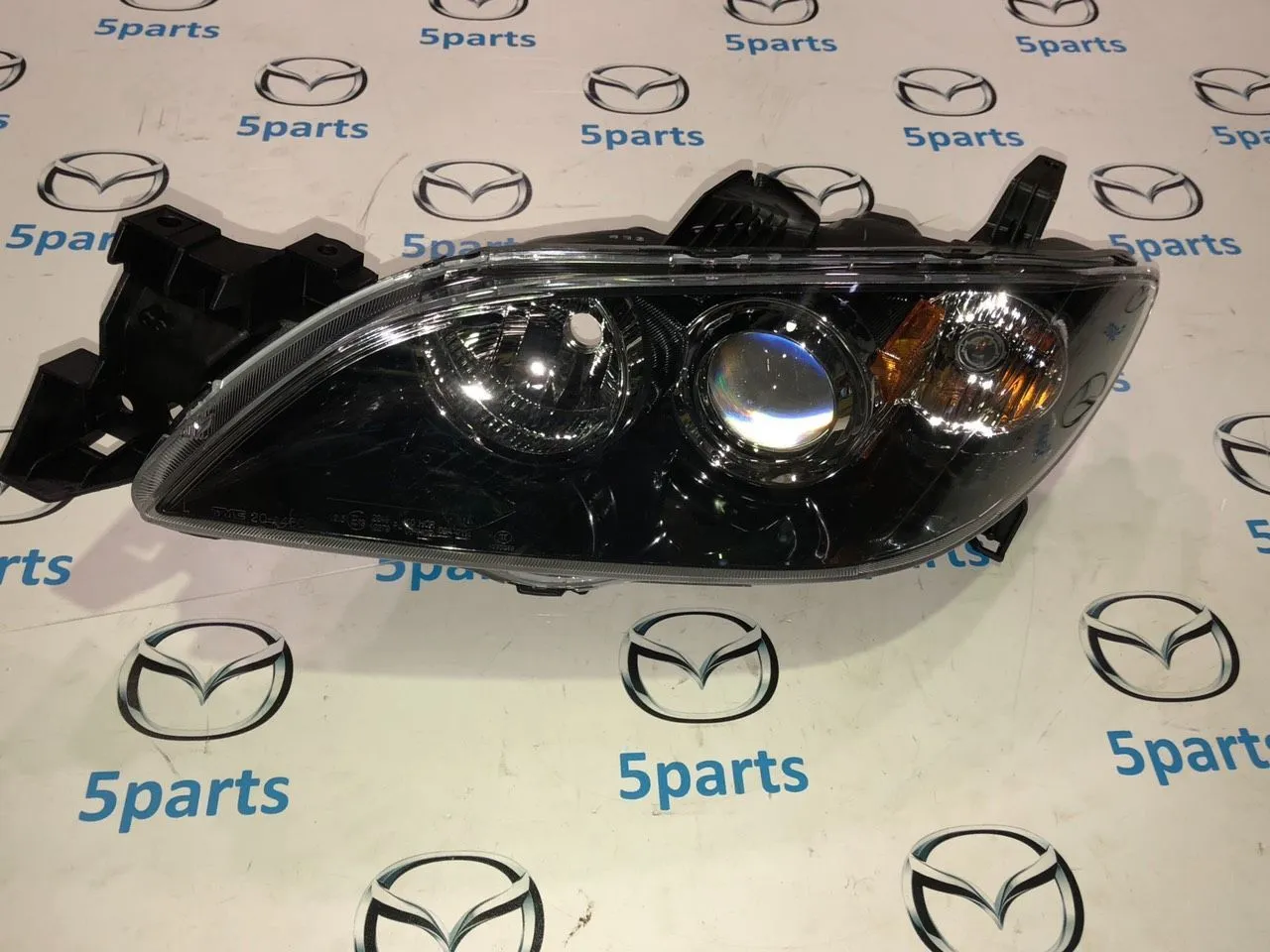 Фара основная левая M3 (BK) SDN 2003-2009