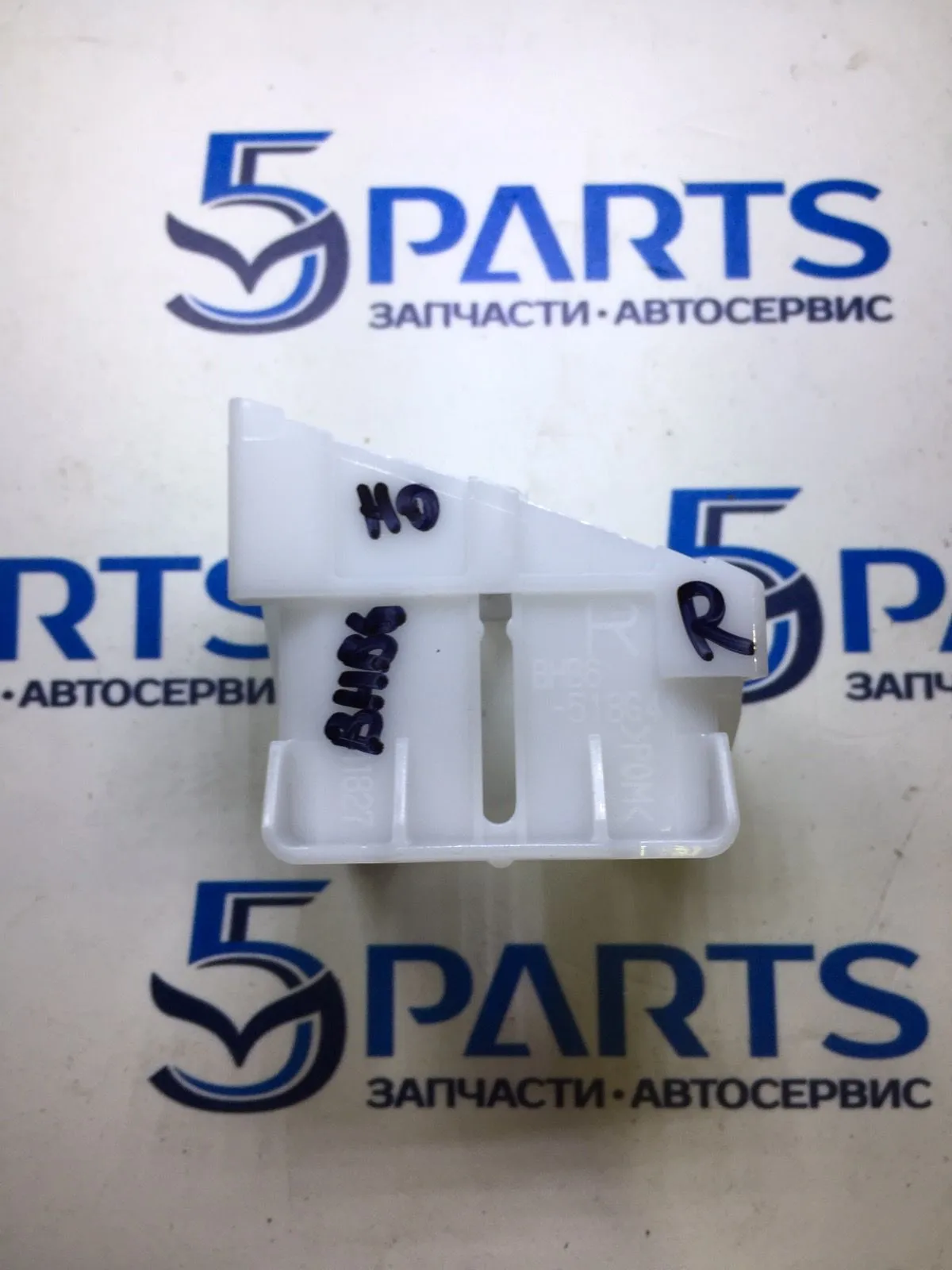 Кронштейн омывателя фар правый M3 (BL) 2011-2013