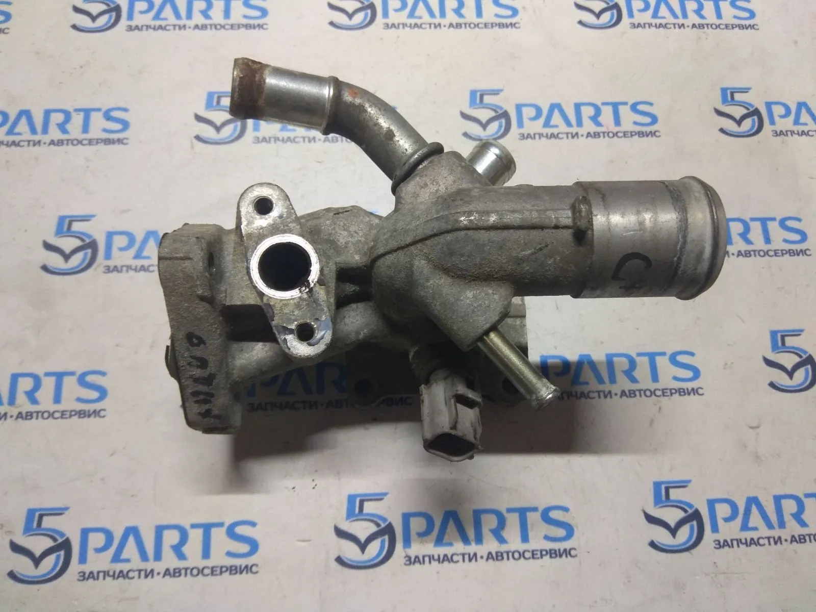 Тройник системы охлаждения M6 (GG) 2002-2007, CX-7 (ER) 2006-2012