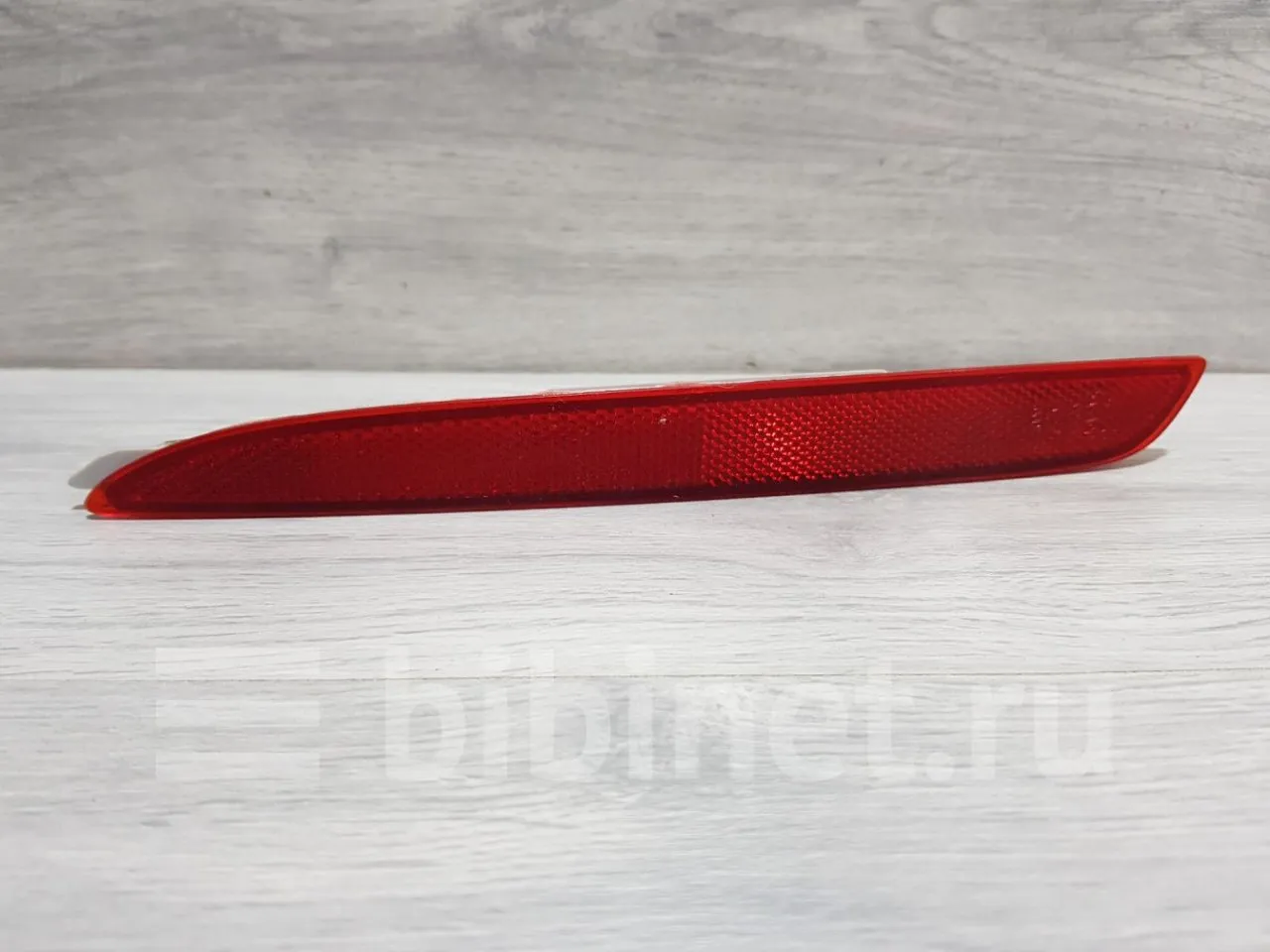 Катафот бампера заднего левый M3 (BL) SDN 2009-2011