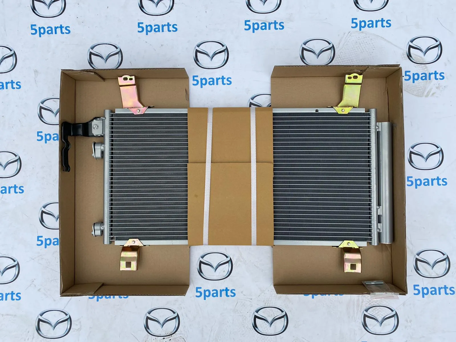 Радиатор кондиционера M6 (GG) 2002-2007