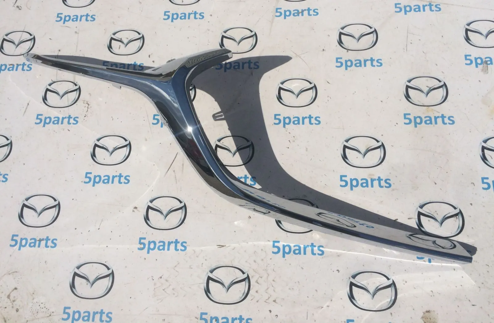 Молдинг решетки радиатора нижний правый M6 (GL) 2019-2022