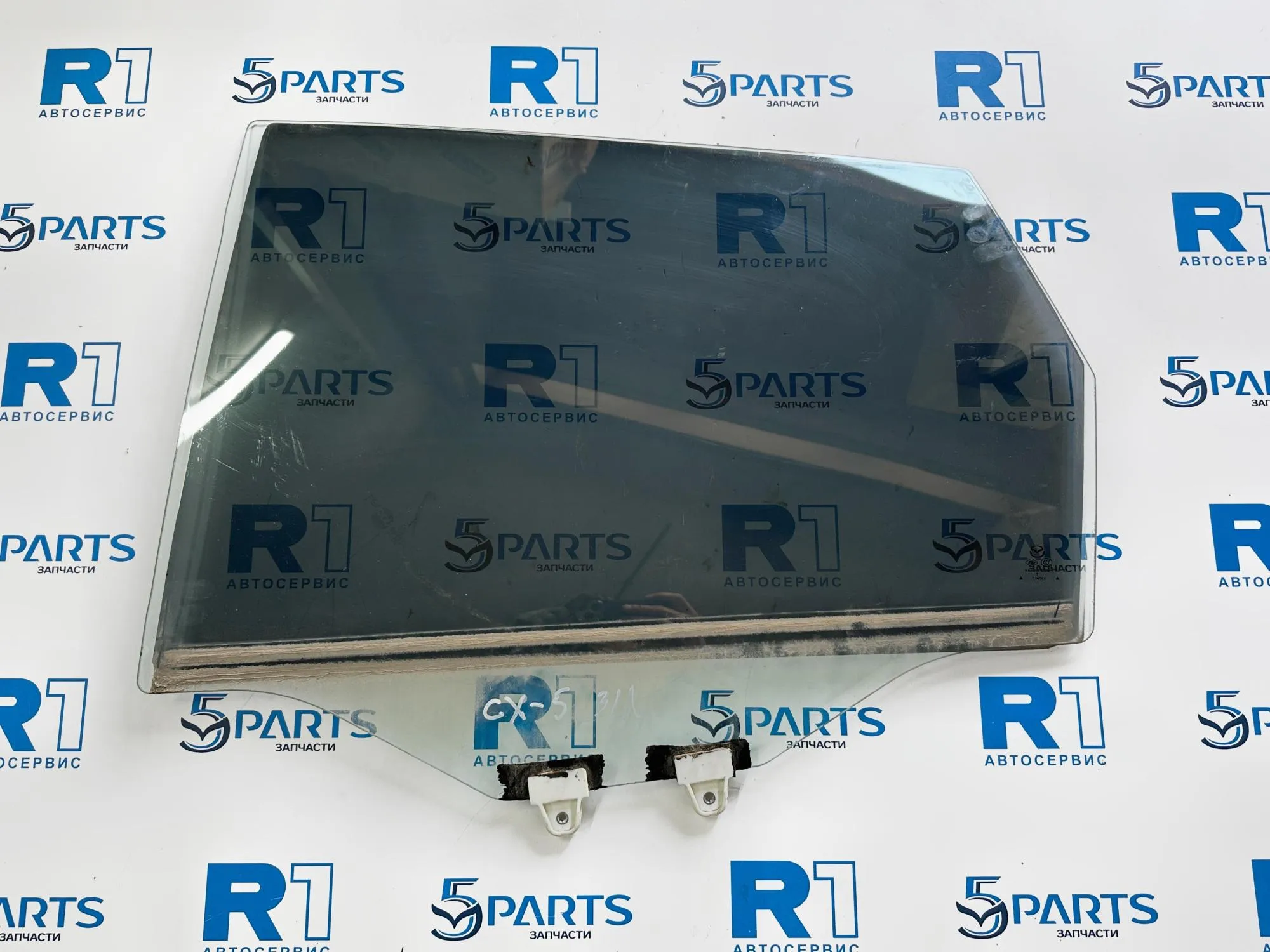 Стекло двери задней левой CX5 (KF) 2017-2025