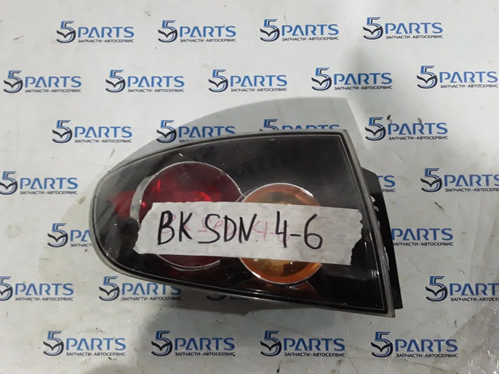 Фонарь внешний левый M3 (BK) SDN 2004-2006