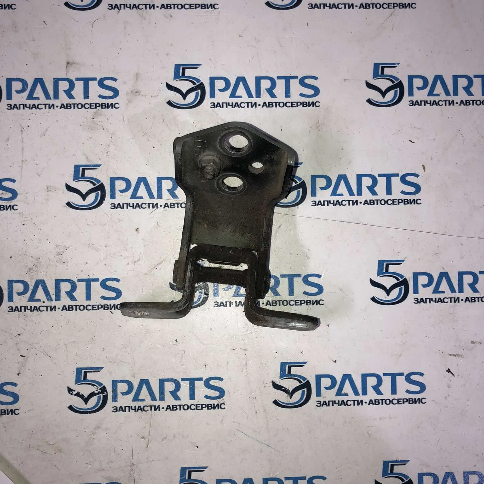 Петля двери передней левой верхняя M3, M6, CX-5, CX-9 (TC)