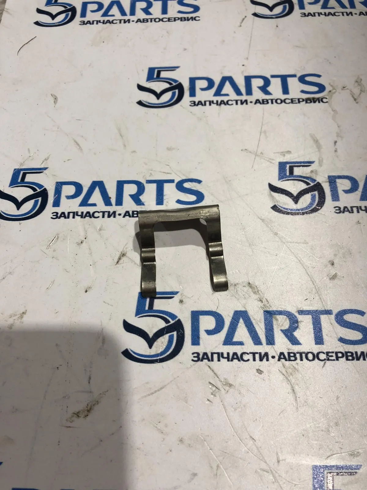 Кронштейн омывателя фар M3, M6, CX-9 2012-2016