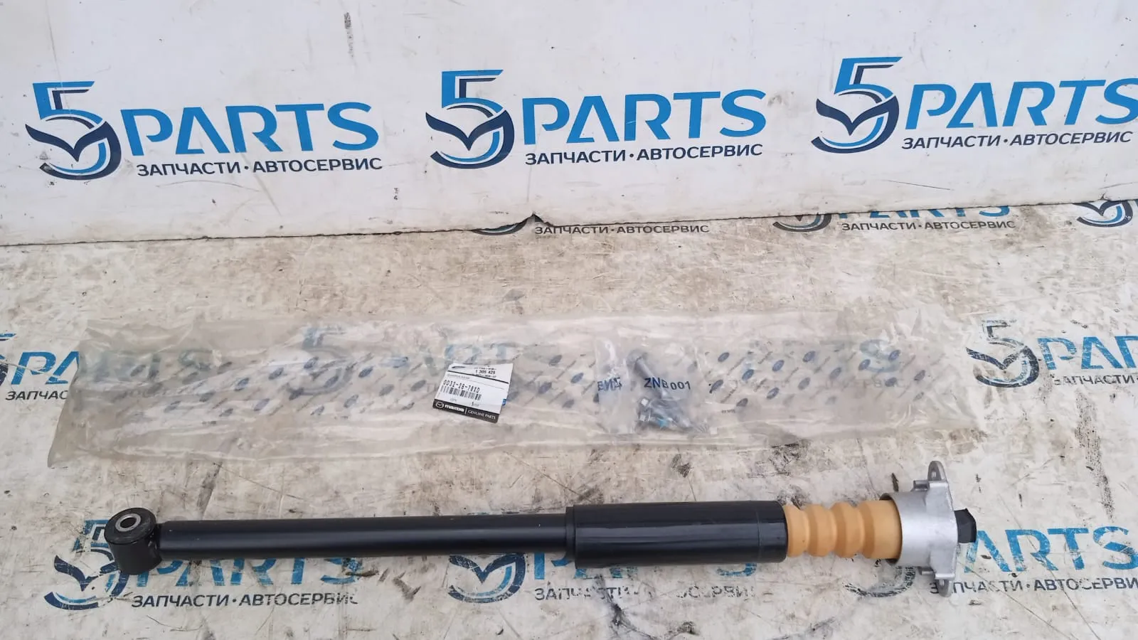 Амортизатор задний (стойка) M2 (DY) 2003-2007