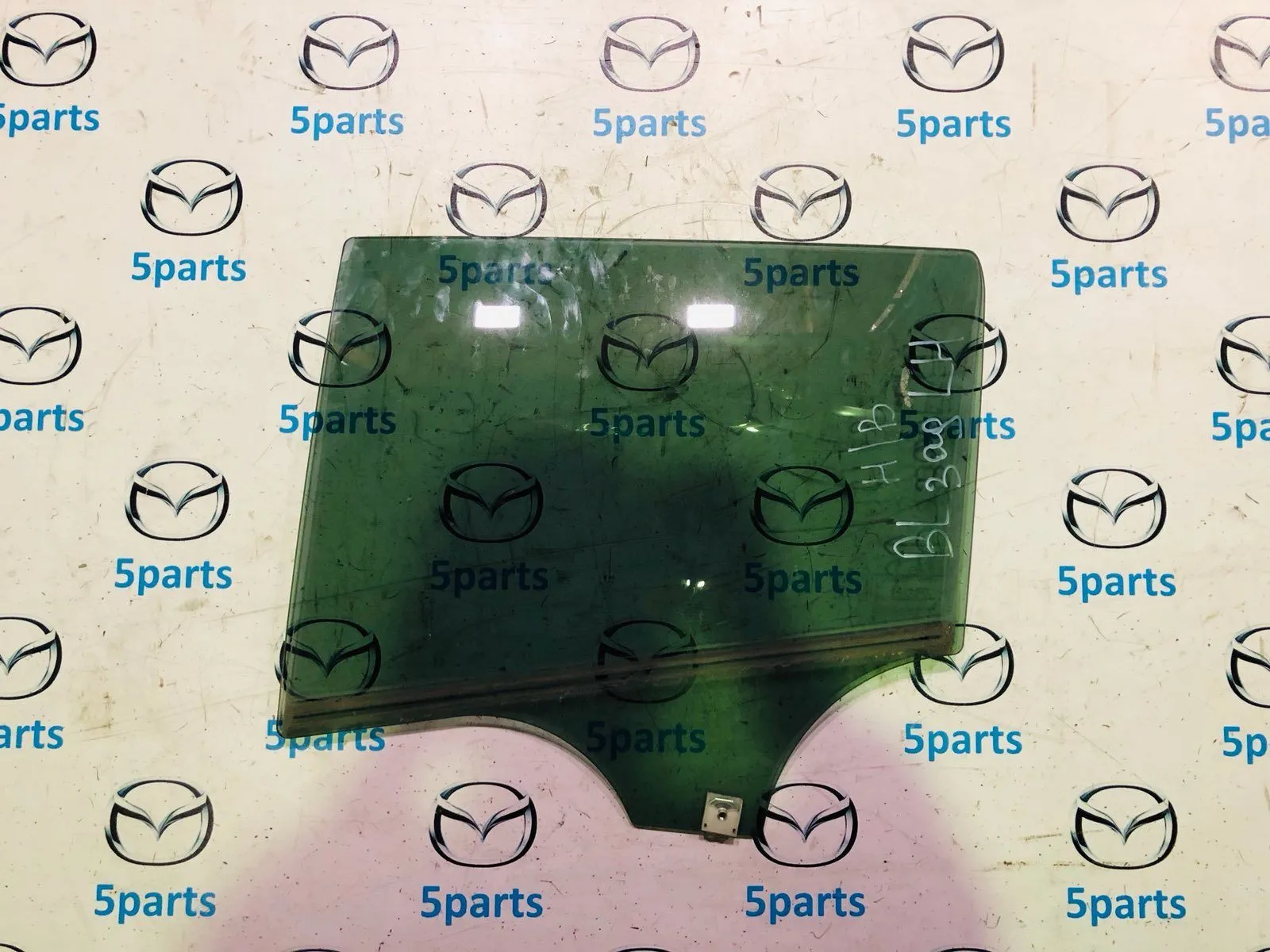 Стекло двери задней левой M3 (BL) HB 2009-2012