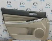 Обшивка двери передней левой CX7 (ER) 2010-2012 купить в Москве