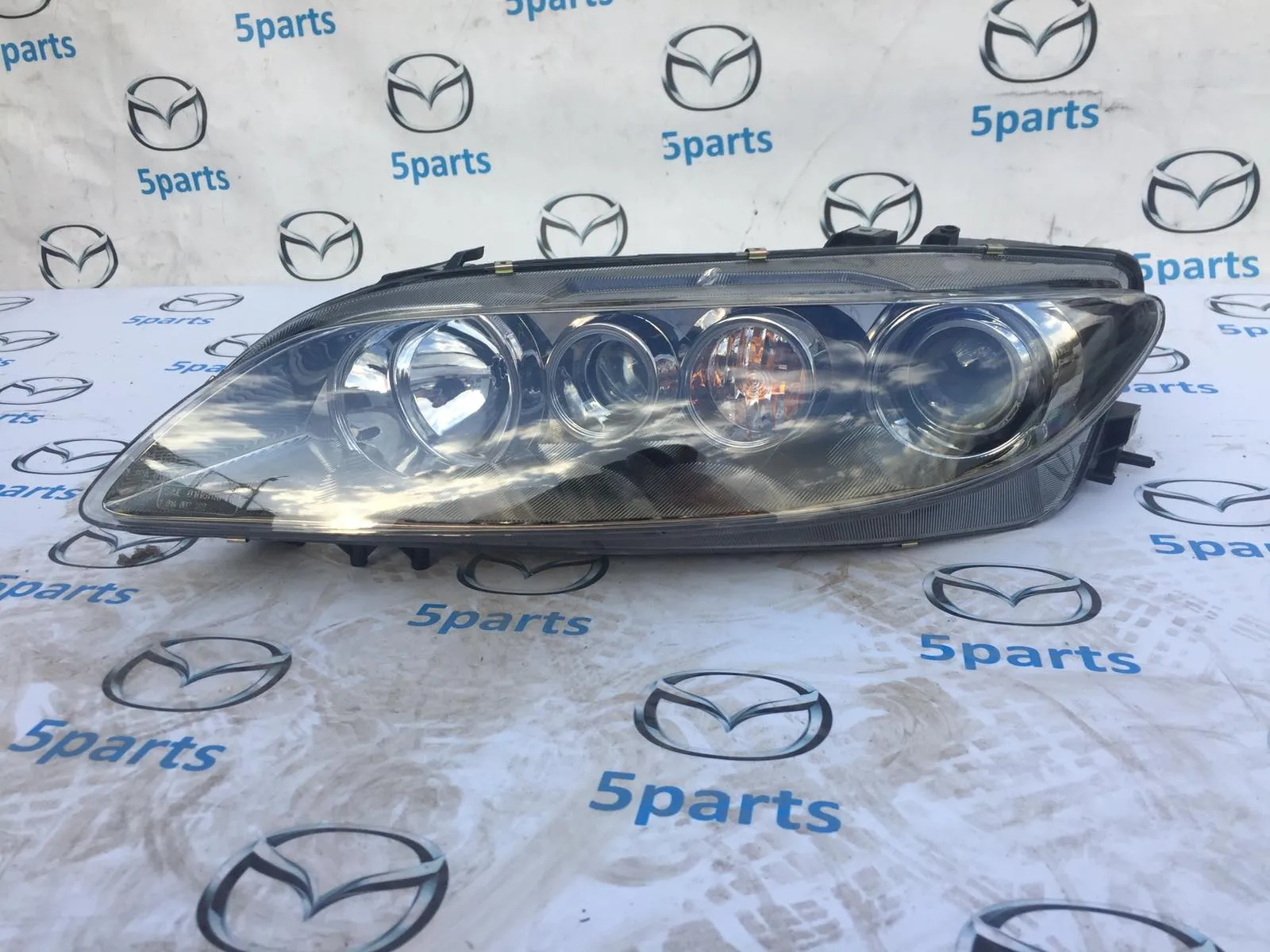 Фара основная левая M6 (GG) 2005-2007