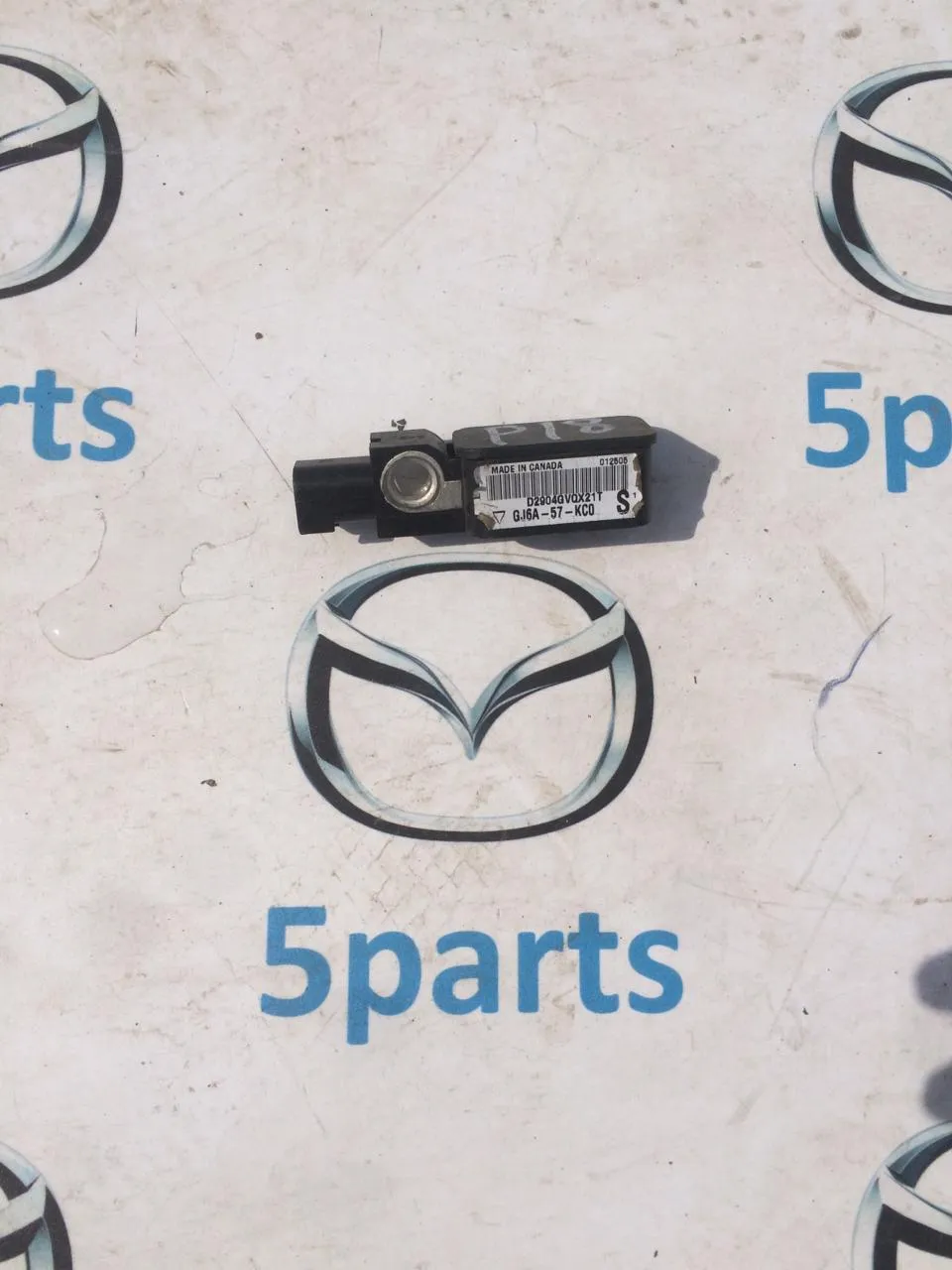 Датчик удара M6 (GG) 2002-2007