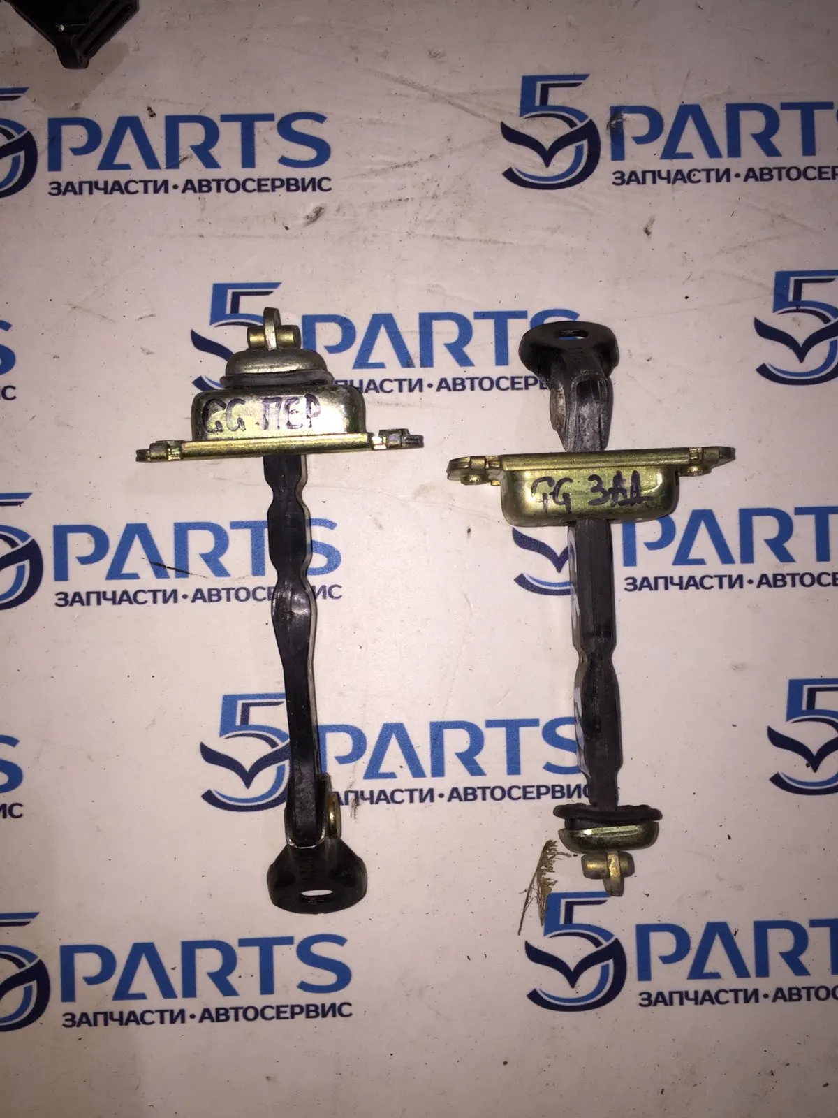 Ограничитель двери задний M6 (GG) 2002-2007