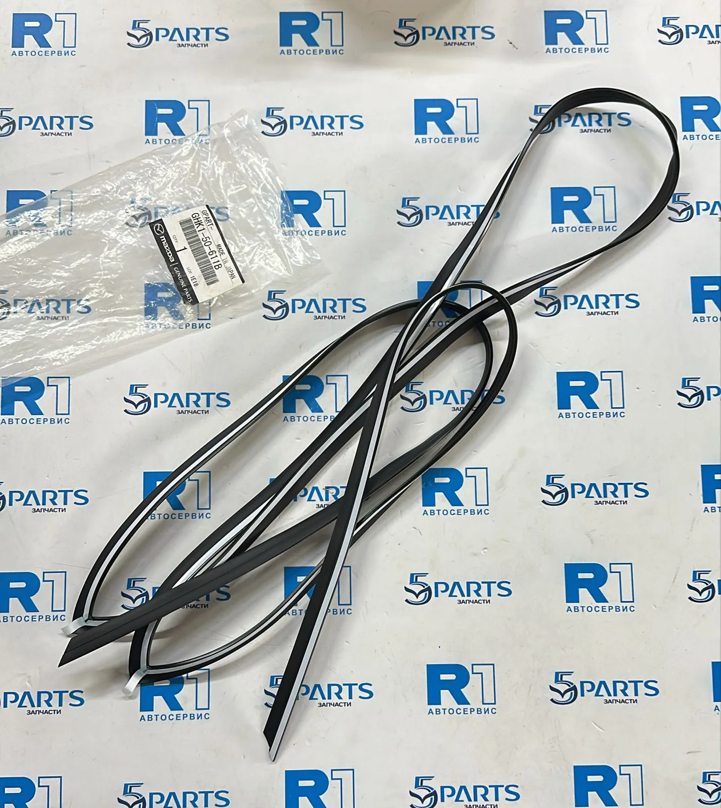 Молдинг стекла заднего (верхний) M6 (GJ) 2013-2022